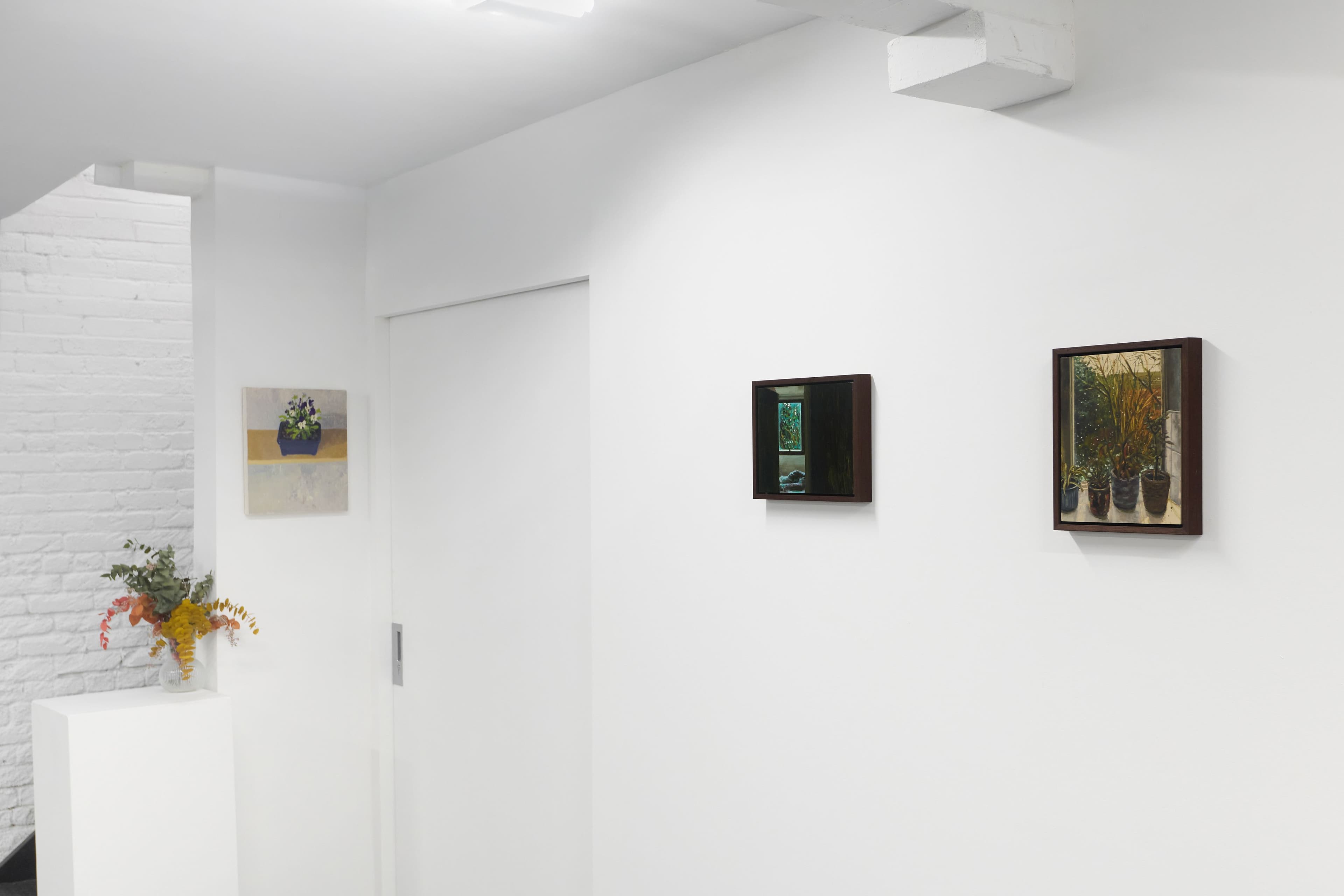Installation image depicting works by Alejandro Sintura and Elena Rivera-Montanes